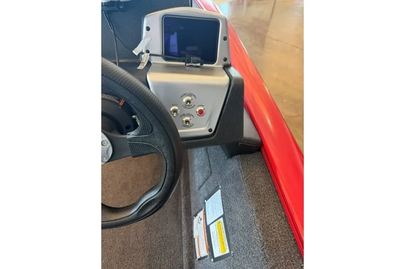 Slide: The Image of 2026 Tracker Pro Team 175 Crappie Edition dashboard with steering wheel and control panel. - 14