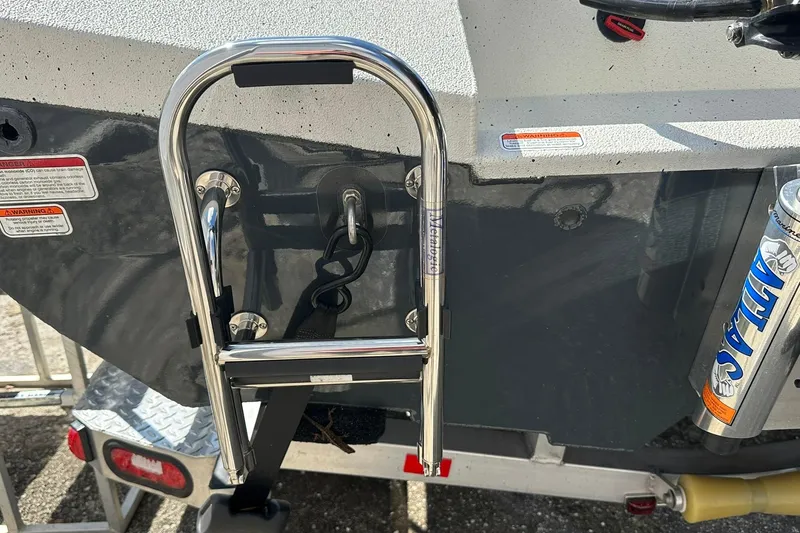 Slide: The Image of 2025 Ranger RB210 boat ladder and motor mount detail. - 26