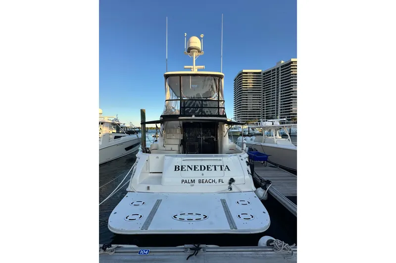 Slide: The Image of 1998 Sea Ray 480 Sedan Bridge yacht docked in Palm Beach marina. - 2