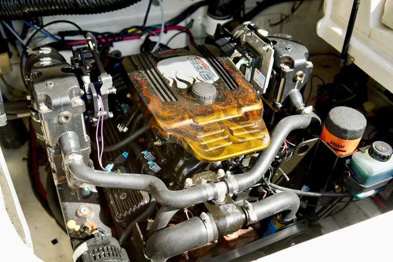 Slide: The Image of Engine compartment of a 2005 Sea Ray 240 Bow Rider boat. - 5