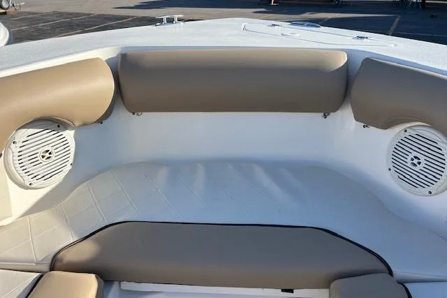 Slide: The Image of Bow seating area of 2019 Key West 239 DFS boat with beige cushions and speakers. - 12