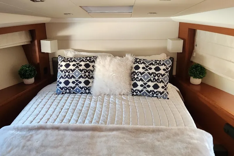 Slide: The Image of Luxurious bedroom interior of 2016 Jeanneau Prestige 50 yacht with elegant bedding and decor. - 15