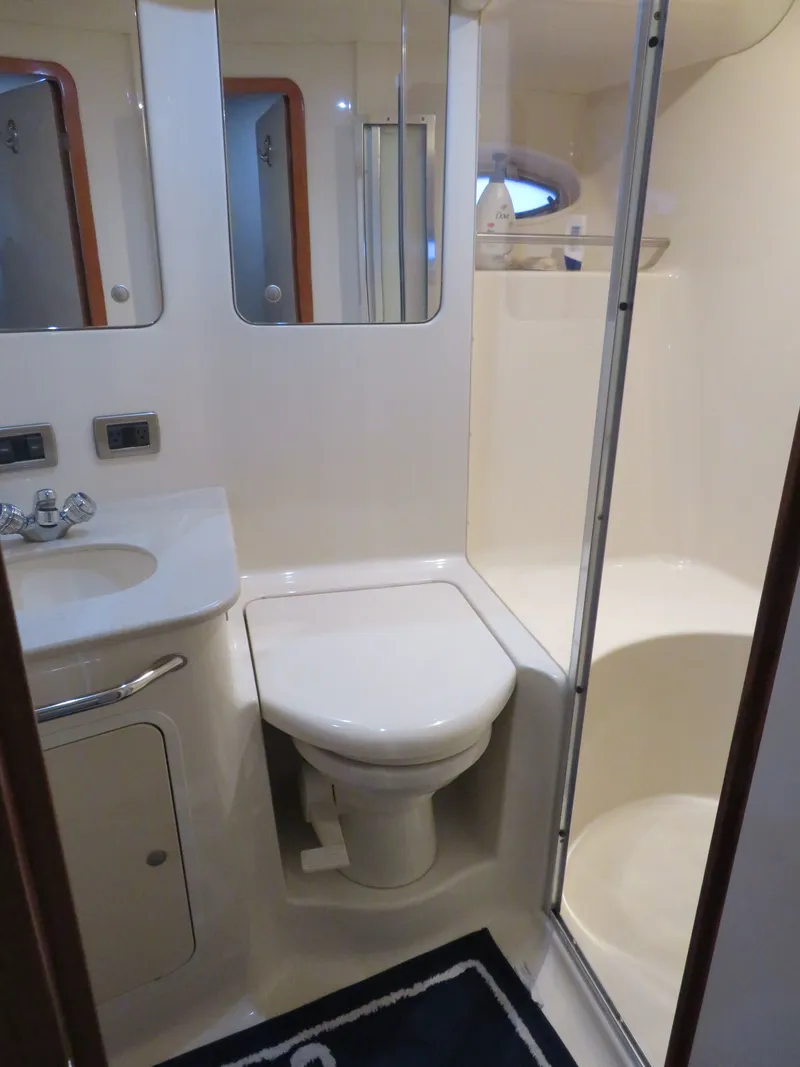 Slide: The Image of Bathroom in 1999 Sea Ray 480 DB boat. - 19