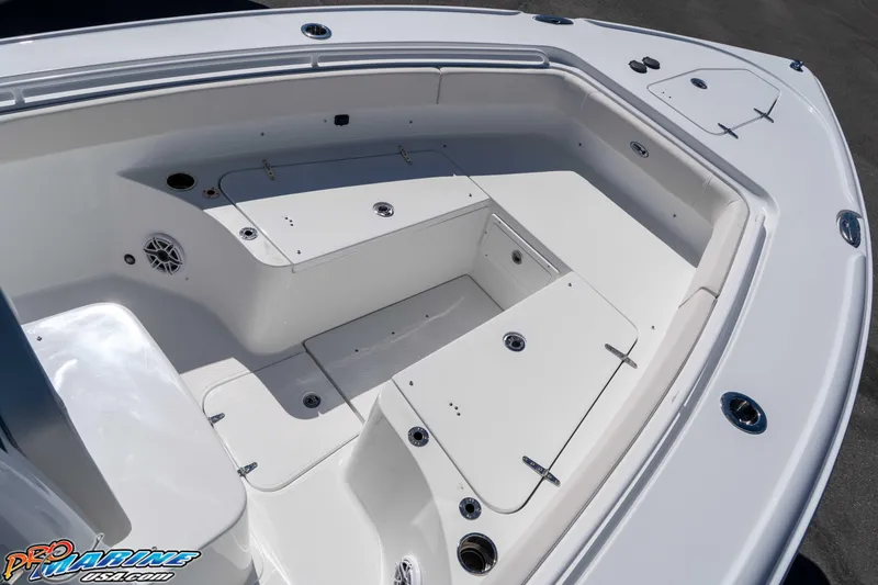 Slide: The Image of 2026 Sea Hunt Ultra 275 SE boat interior with seating and storage compartments. - 22