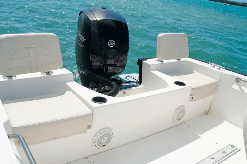 Slide: The Image of 2020 Boston Whaler 190 Montauk boat interior with open storage compartment. - 14