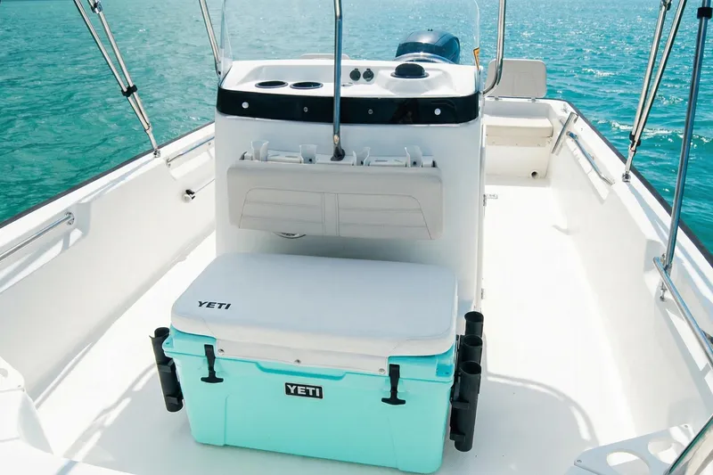 Slide: The Image of Dashboard of 2020 Boston Whaler 190 Montauk with navigation display and speedometer. - 6