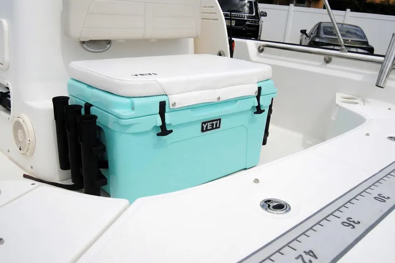 Slide: The Image of 2020 Boston Whaler 190 Montauk boat interior with Yeti cooler on deck. - 8