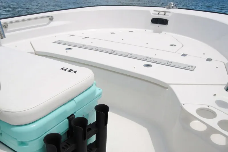 Slide: The Image of 2020 Boston Whaler 190 Montauk boat interior with Yeti cooler on deck. - 9