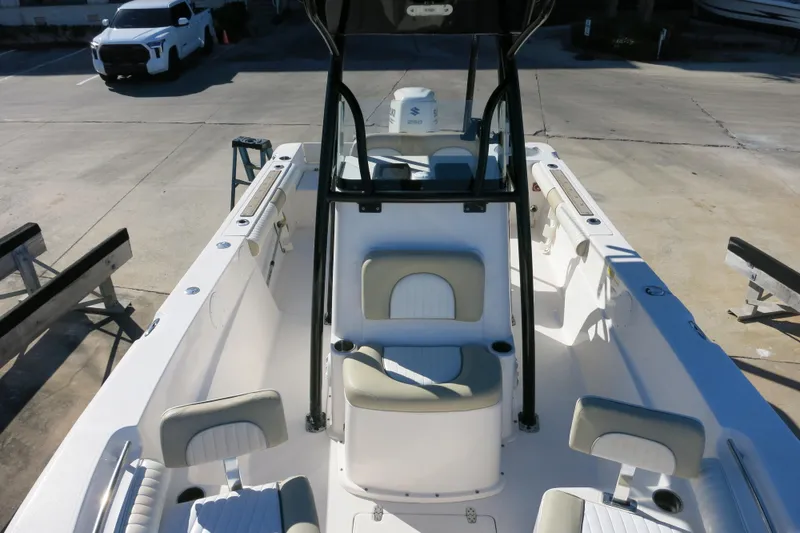Slide: The Image of 2019 Sea Born LX22 Center Console boat interior with seating and console view. - 20