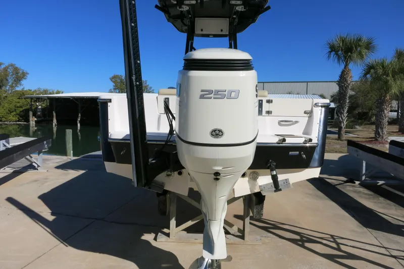 Slide: The Image of 2019 Sea Born LX22 Center Console boat with 250 horsepower engine, docked outdoors. - 24