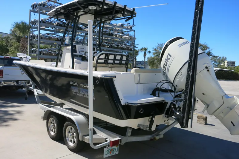Slide: The Image of 2019 Sea Born LX22 Center Console boat with Suzuki 250 engine on trailer. - 29