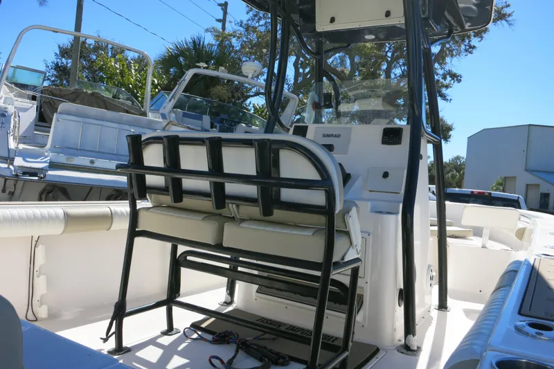 Slide: The Image of 2019 Sea Born LX22 Center Console boat interior with seating and console view. - 31