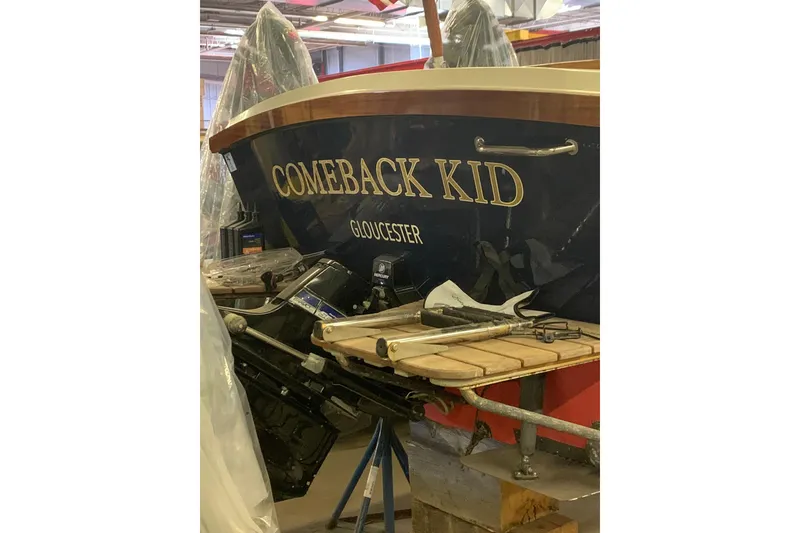 Slide: The Image of 1973 Lyman Islander boat named "Comeback Kid" in a workshop, Gloucester. - 4