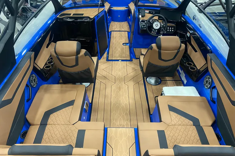 Slide: The Image of 2025 Yamaha Boats 222XD interior with luxurious seating and modern dashboard design. - 2