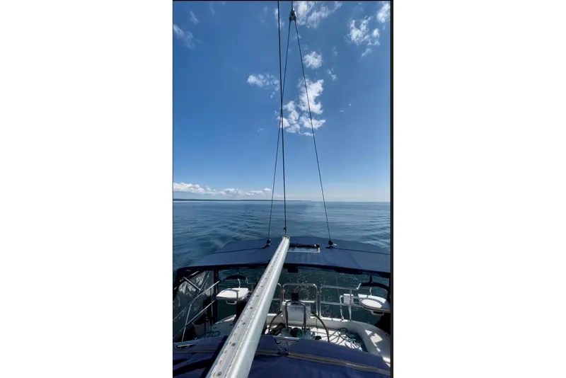 Slide: The Image of Sailing on a 2004 Catalina 350 yacht under clear blue skies. - 13