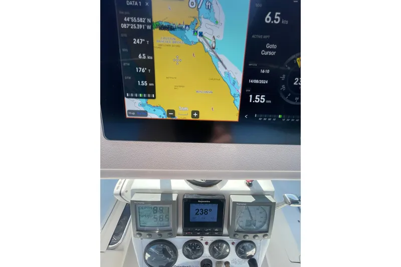 Slide: The Image of Navigation display and instruments on a 2004 Catalina 350 sailboat. - 17