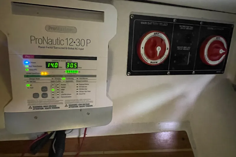 Slide: The Image of ProNautic 12:30 P charger and battery selector in 2004 Catalina 350 yacht. - 32