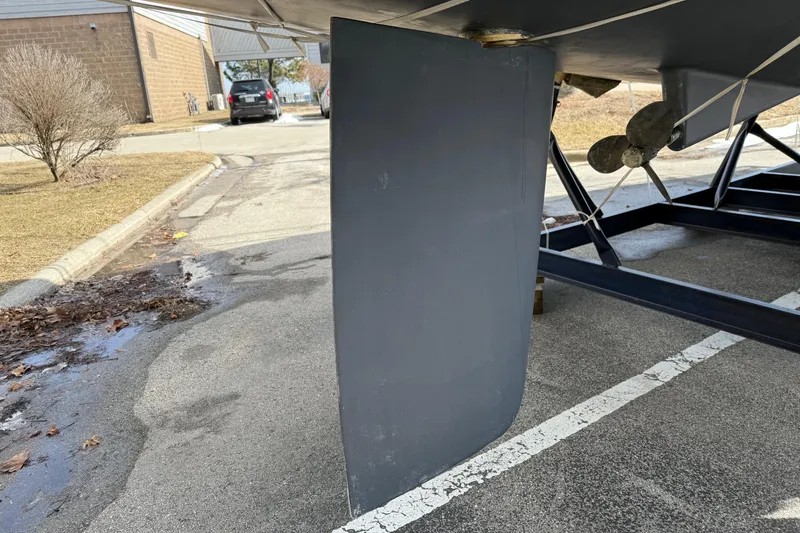 Slide: The Image of Catalina 350 sailboat rudder and propeller on trailer, 2004 model. - 37