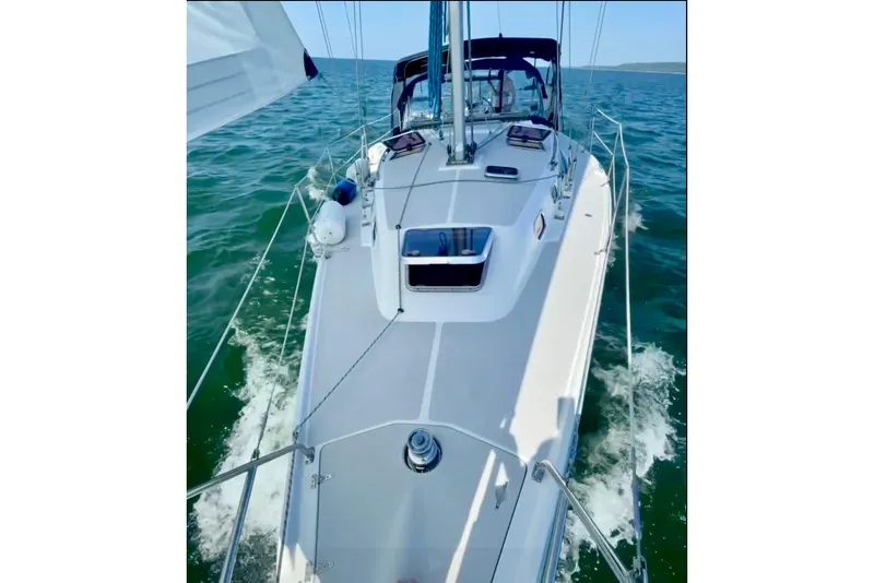 Slide: The Image of Sailing on a 2004 Catalina 350 yacht in open waters. - 6