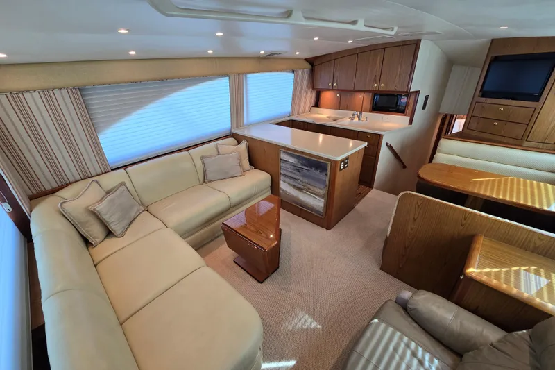 Slide: The Image of Luxurious interior of 2007 Ocean Yachts 46 Super Sport with elegant seating and modern kitchen. - 12