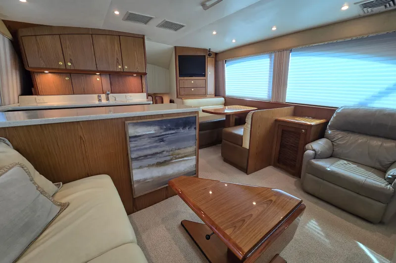 Slide: The Image of Luxurious interior of 2007 Ocean Yachts 46 Super Sport with elegant wood finishes. - 13