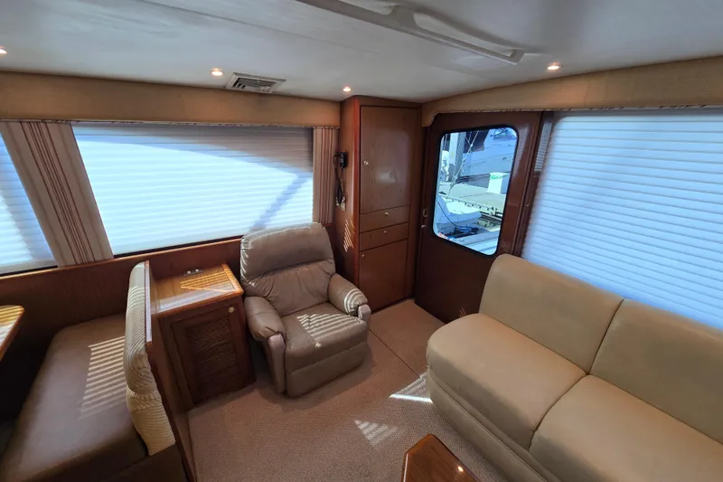 Slide: The Image of Luxurious interior of 2007 Ocean Yachts 46 Super Sport with plush seating and elegant design. - 16