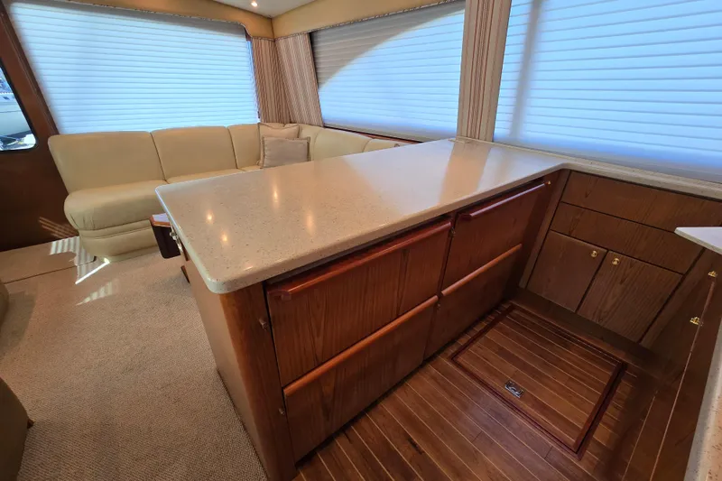 Slide: The Image of Luxurious interior of 2007 Ocean Yachts 46 Super Sport with elegant wood cabinetry. - 22