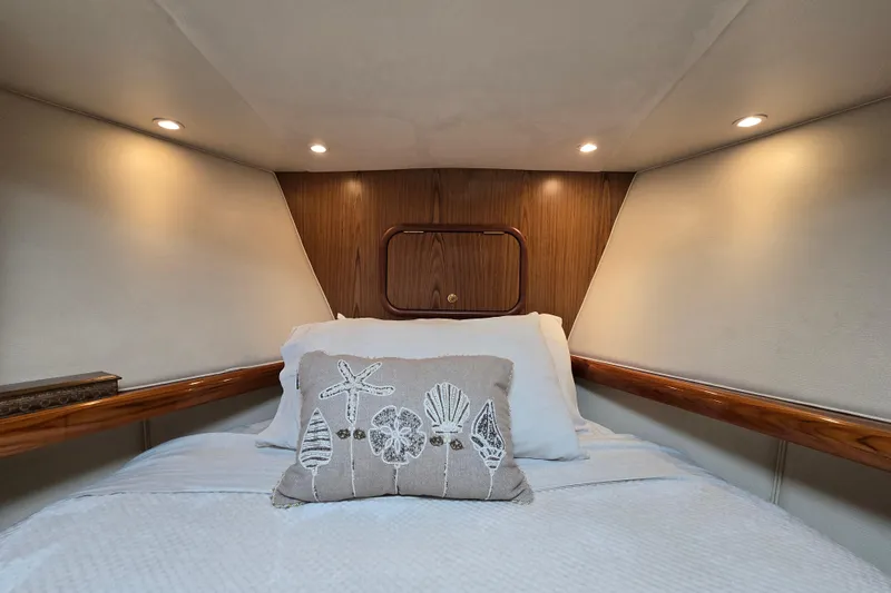 Slide: The Image of Cozy cabin interior of 2007 Ocean Yachts 46 Super Sport with decorative pillow. - 33