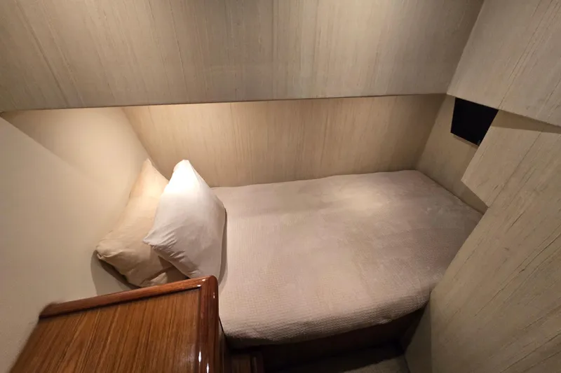 Slide: The Image of Cozy cabin interior of 2007 Ocean Yachts 46 Super Sport with comfortable bedding. - 36