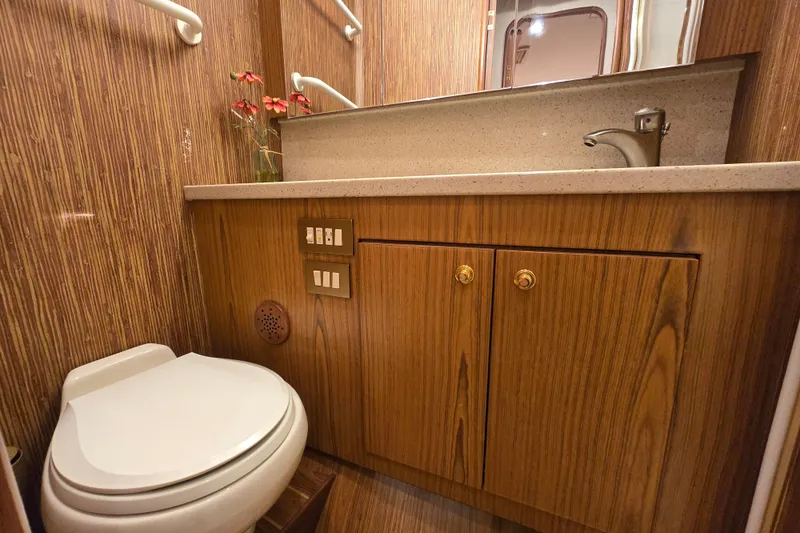 Slide: The Image of Luxurious 2007 Ocean Yachts 46 Super Sport bathroom with wood finish and modern fixtures. - 41