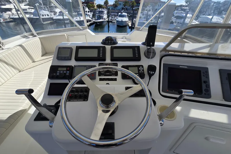 Slide: The Image of Helm of 2007 Ocean Yachts 46 Super Sport with navigation instruments and steering wheel. - 45