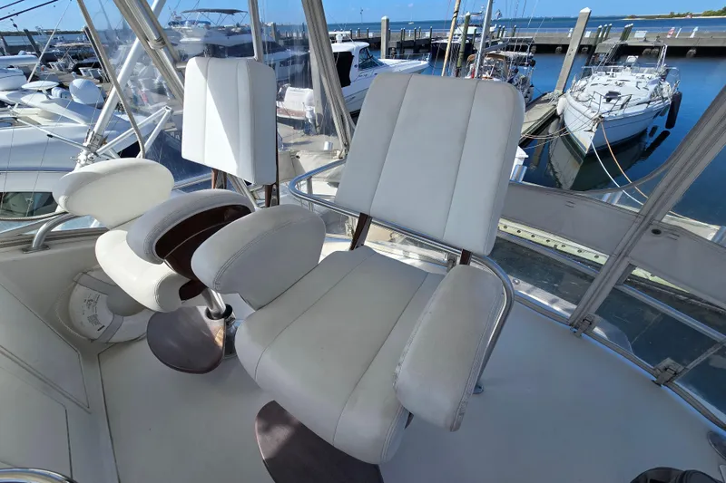 Slide: The Image of Captain's chairs on 2007 Ocean Yachts 46 Super Sport, docked at marina. - 49