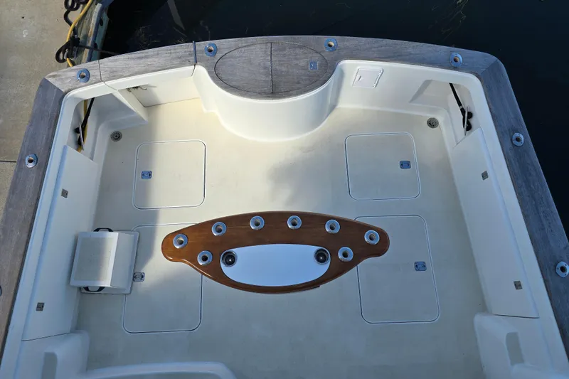 Slide: The Image of 2007 Ocean Yachts 46 Super Sport cockpit with wooden accents and storage compartments. - 53
