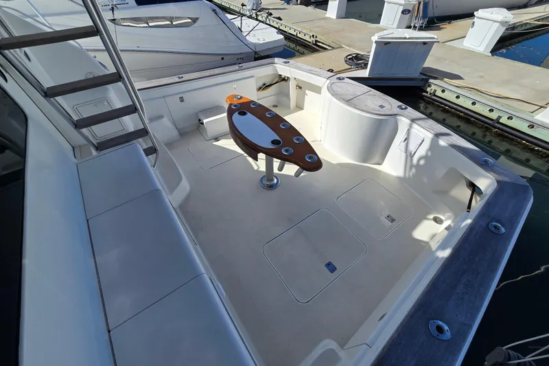 Slide: The Image of 2007 Ocean Yachts 46 Super Sport yacht deck with seating and fishing table. - 54