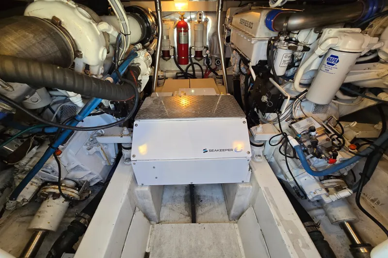 Slide: The Image of Engine room of 2007 Ocean Yachts 46 Super Sport with Seakeeper stabilizer system. - 65