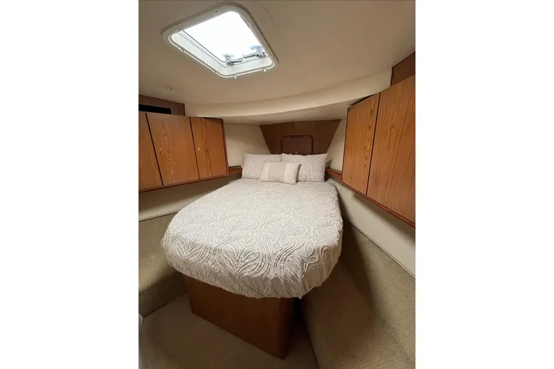 Slide: The Image of Luxurious interior of 2007 Ocean Yachts 46 Super Sport with modern kitchen and seating area. - 8