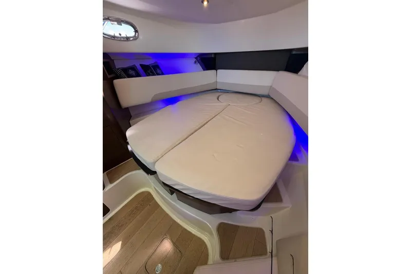 Slide: The Image of Luxurious interior of 2023 Boston Whaler 345 Conquest with plush seating and ambient lighting. - 13