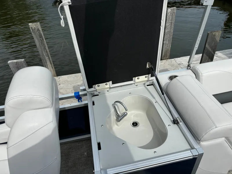 Slide: The Image of 2022 Tahoe GT 2585 CCF Tritoon with built-in sink. - 15