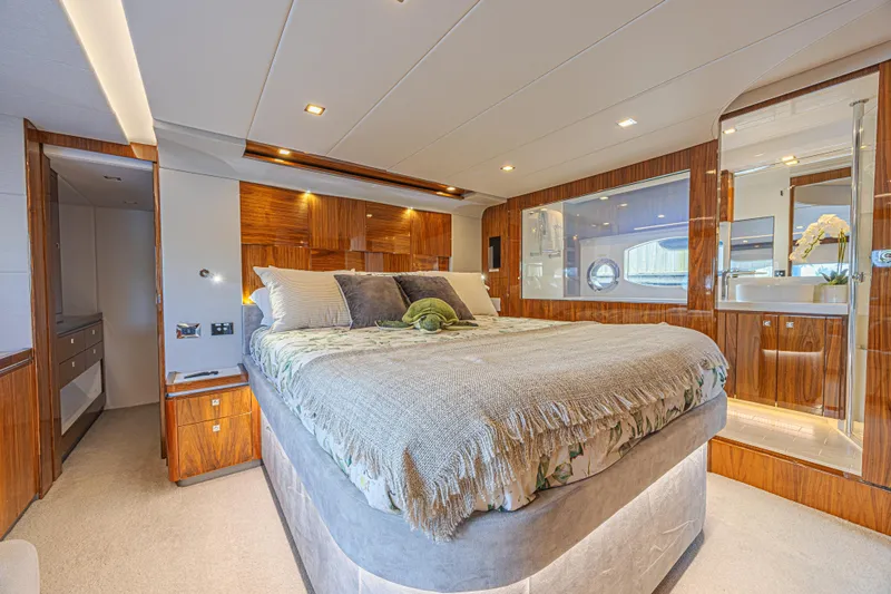 Slide: The Image of Luxurious bedroom interior of 2021 Riviera 6000 Sport Yacht Platinum Edition. - 19