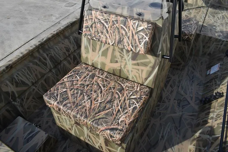 Slide: The Image of 2026 Lowe Roughneck RX1860 Tunnel Jet boat with camouflage seating design. - 20