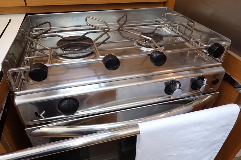 Slide: The Image of Stainless steel stove in 2018 Jeanneau Sun Odyssey 389 yacht kitchen. - 106