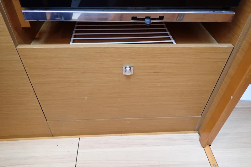 Slide: The Image of Wooden cabinet with metal handle in Jeanneau Sun Odyssey 389, 2018 model. - 107