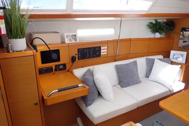 Slide: The Image of Interior of 2018 Jeanneau Sun Odyssey 389 yacht with cozy seating and modern decor. - 11