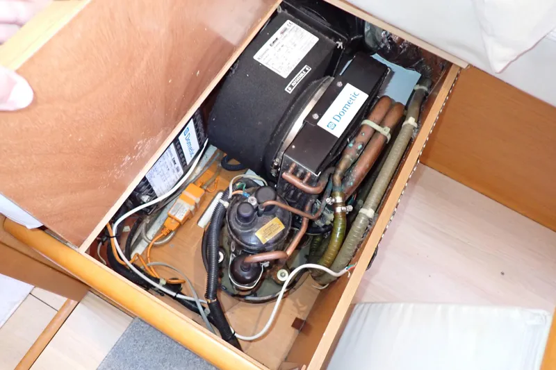 Slide: The Image of Engine compartment of 2018 Jeanneau Sun Odyssey 389 sailboat, featuring Dometic equipment. - 132