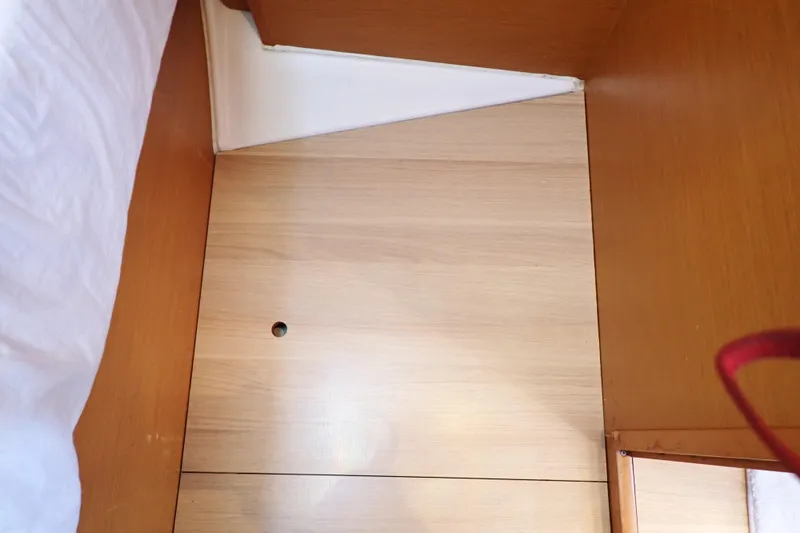 Slide: The Image of Wooden interior of 2018 Jeanneau Sun Odyssey 389 sailboat cabin. - 149