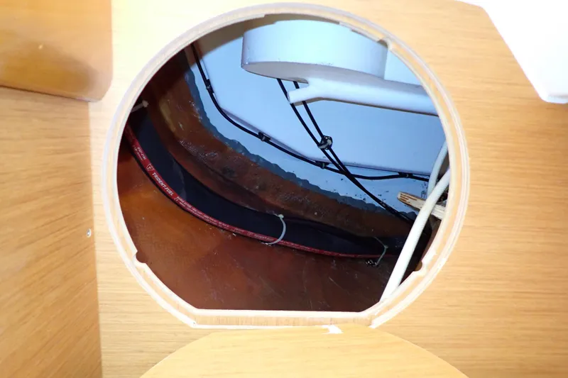 Slide: The Image of Interior view of Jeanneau Sun Odyssey 389, 2018 model, showing wiring and structural details. - 154