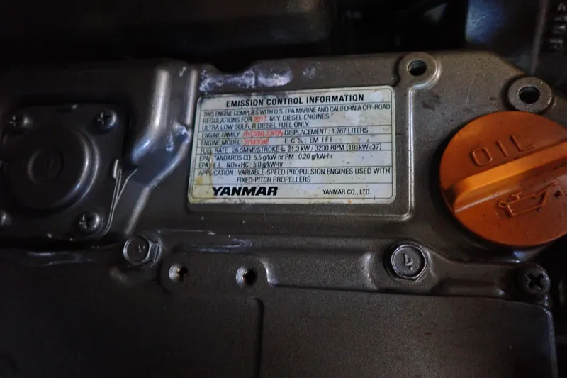 Slide: The Image of Yanmar engine emission control label on Jeanneau Sun Odyssey 389, 2018 model. - 160
