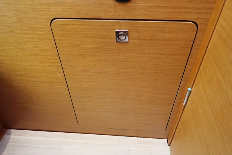 Slide: The Image of Wooden cabinet door on 2018 Jeanneau Sun Odyssey 389 yacht interior. - 164