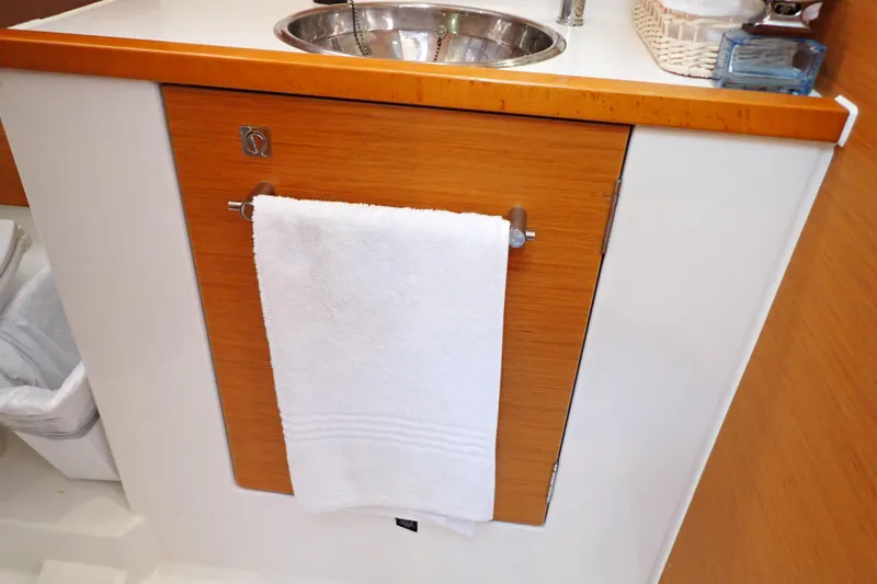 Slide: The Image of Wooden cabinet with towel and sink on Jeanneau Sun Odyssey 389, 2018 model. - 172