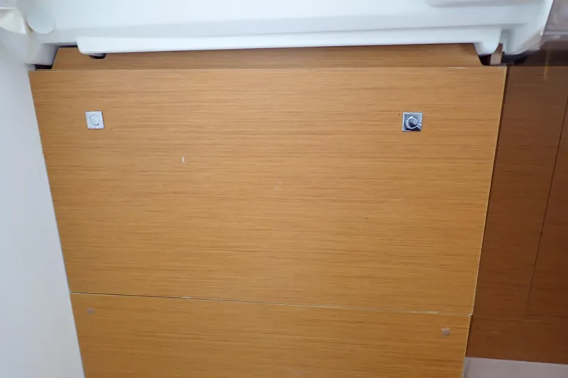 Slide: The Image of Wooden panel detail on 2018 Jeanneau Sun Odyssey 389 yacht interior. - 178